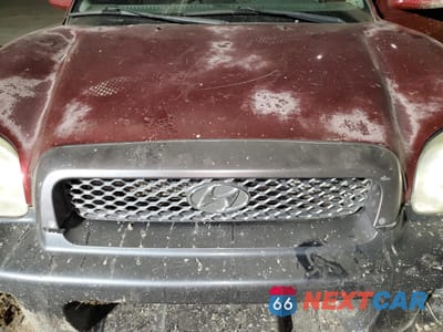 Zdjęcie 11 z 12 samochodu: 2003 HYUNDAI SANTA FE GLS VIN:KM8SC13D83U353745 - miniatura