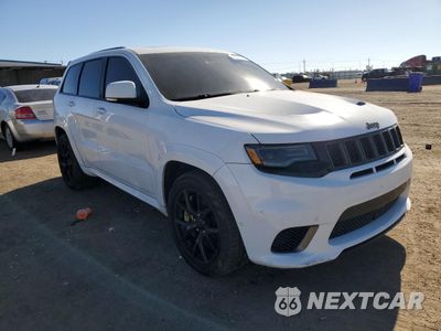 Czwarte zdjęcie samochodu z boku: 2018 JEEP GRAND CHEROKEE TRACKHAWK VIN:1C4RJFN93JC440261 - miniatura