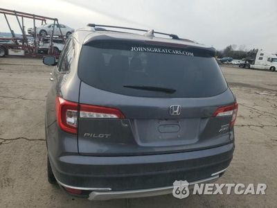 Zdjęcie 6 z 13 samochodu: 2019 HONDA PILOT TOURING VIN:5FNYF6H96KB087429 - miniatura
