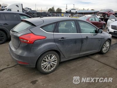 Trzecie zdjęcie samochodu z tyłu: 2018 FORD FOCUS TITANIUM VIN:1FADP3N21JL204269 - miniatura