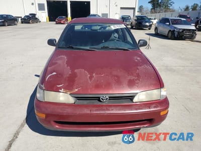 Piąte zdjęcie samochodu w środku: 1995 TOYOTA COROLLA VIN:1NXAE04B0SZ340340 - miniatura