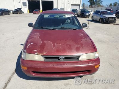 Piąte zdjęcie samochodu w środku: 1995 TOYOTA COROLLA VIN:1NXAE04B0SZ340340 - miniatura