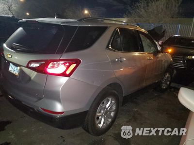 Trzecie zdjęcie samochodu z tyłu: 2018 CHEVROLET EQUINOX LT VIN:3GNAXJEV7JL352904 - miniatura