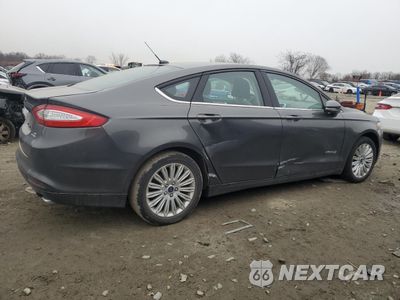 Trzecie zdjęcie samochodu z tyłu: 2016 FORD FUSION SE HYBRID VIN:3FA6P0LU4GR330535 - miniatura
