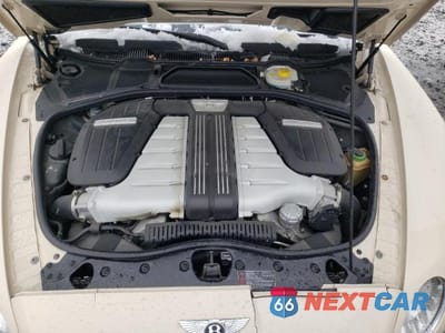 Zdjęcie 11 z 11 samochodu: 2014 BENTLEY CONTINENTAL GTC VIN:SCBGU3ZA5EC088777 - miniatura