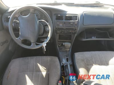 Zdjęcie 8 z 14 samochodu: 1995 TOYOTA COROLLA VIN:1NXAE04B0SZ340340 - miniatura