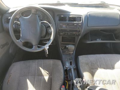 Zdjęcie 8 z 14 samochodu: 1995 TOYOTA COROLLA VIN:1NXAE04B0SZ340340 - miniatura