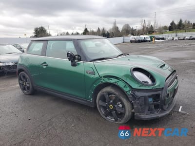 Czwarte zdjęcie samochodu z boku: 2023 MINI COOPER SE VIN:WMW13DJ02P2T05559 - miniatura