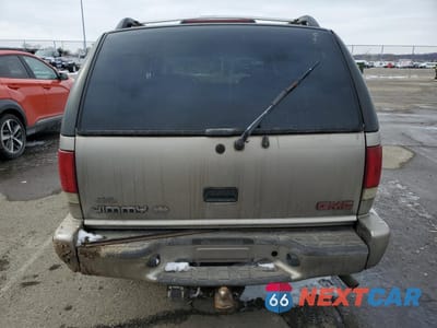 Zdjęcie 6 z 13 samochodu: 2000 GMC JIMMY VIN:1GKCS13W2Y2291635 - miniatura