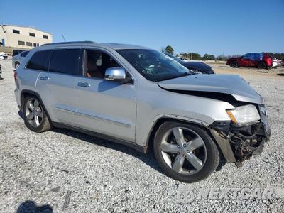 Czwarte zdjęcie samochodu z boku: 2012 JEEP GRAND CHEROKEE OVERLAND VIN:1C4RJFCG1CC285455 - miniatura