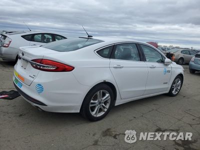 Trzecie zdjęcie samochodu z tyłu: 2018 FORD FUSION SE HYBRID VIN:3FA6P0LU8JR129955 - miniatura