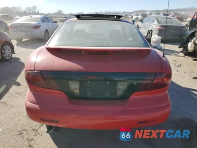 Zdjęcie 6 z 14 samochodu: 1999 PONTIAC SUNFIRE SE VIN:1G2JB1247X7533392 - miniatura