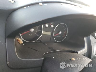 Zdjęcie 9 z 12 samochodu: 2005 HYUNDAI TIBURON VIN:KMHHM65D25U176369 - miniatura