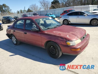 Czwarte zdjęcie samochodu z boku: 1995 TOYOTA COROLLA VIN:1NXAE04B0SZ340340 - miniatura