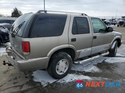 Trzecie zdjęcie samochodu z tyłu: 2000 GMC JIMMY VIN:1GKCS13W2Y2291635 - miniatura