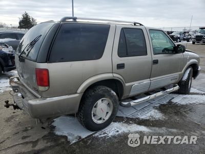 Trzecie zdjęcie samochodu z tyłu: 2000 GMC JIMMY VIN:1GKCS13W2Y2291635 - miniatura
