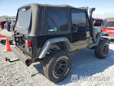 Trzecie zdjęcie samochodu z tyłu: 1997 JEEP WRANGLER / TJ SPORT VIN:1J4FY19S6VP474444 - miniatura