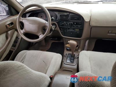 Zdjęcie 12 z 16 samochodu: 1994 TOYOTA CAMRY LE VIN:4T1GK12EXRU018689 - miniatura