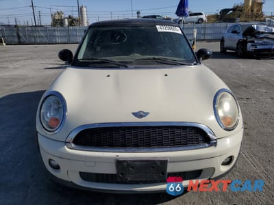 Piąte zdjęcie samochodu w środku: 2007 MINI COOPER VIN:WMWMF33537TT53475 - miniatura