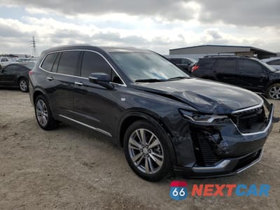 Czwarte zdjęcie samochodu z boku: 2022 CADILLAC XT6 PREMIUM LUXURY VIN:1GYKPCRS1NZ104567 - miniatura