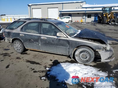 Czwarte zdjęcie samochodu z boku: 1994 HONDA ACCORD LX VIN:1HGCE1832RA002117 - miniatura