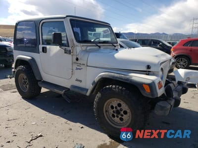 Czwarte zdjęcie samochodu z boku: 1998 JEEP WRANGLER / TJ SPORT VIN:1J4FY19S3WP710839 - miniatura