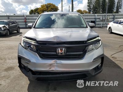 Piąte zdjęcie samochodu w środku: 2022 HONDA PILOT SE VIN:5FNYF5H27NB021117 - miniatura