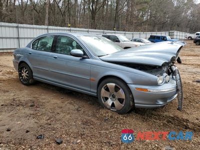 Czwarte zdjęcie samochodu z boku: 2003 JAGUAR X-TYPE 3.0 VIN:SAJEA51C13WD39882 - miniatura