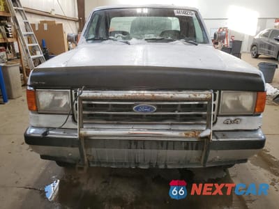 Piąte zdjęcie samochodu w środku: 1991 FORD F150 VIN:1FTEX14N7MKA09821 - miniatura