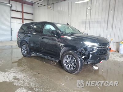 Czwarte zdjęcie samochodu z boku: 2021 CHEVROLET TAHOE K1500 Z71 VIN:1GNSKPKD8MR393038 - miniatura