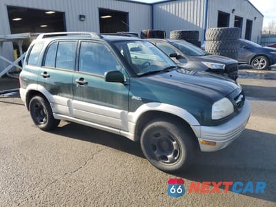 Czwarte zdjęcie samochodu z boku: 2000 SUZUKI GRAND VITARA JLX LIMITED VIN:JS3TD62V7Y4130957 - miniatura