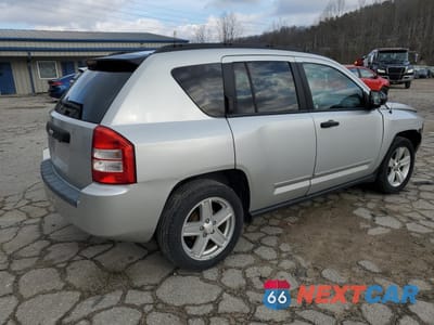 Trzecie zdjęcie samochodu z tyłu: 2009 JEEP COMPASS SPORT VIN:1J4FT47A79D124239 - miniatura