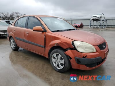 Czwarte zdjęcie samochodu z boku: 2009 KIA RIO BASE VIN:KNADE223596571710 - miniatura