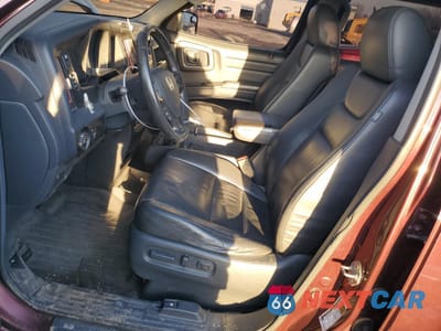 Zdjęcie 7 z 14 samochodu: 2010 HONDA RIDGELINE RTL VIN:5FPYK1F54AB003869 - miniatura