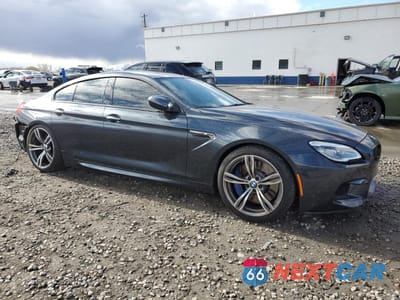Czwarte zdjęcie samochodu z boku: 2017 BMW M6 GRAN COUPE VIN:WBS6E9C58HG437411 - miniatura