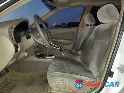 Zdjęcie 7 z 12 samochodu: 2000 NISSAN SENTRA BASE VIN:3N1CB51DXYL345902 - miniatura