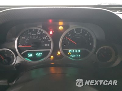 Zdjęcie 9 z 14 samochodu: 2008 JEEP WRANGLER UNLIMITED SAHARA VIN:1J8GB59118L589452 - miniatura
