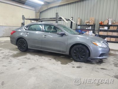 Czwarte zdjęcie samochodu z boku: 2016 NISSAN ALTIMA 2.5 VIN:1N4AL3AP8GC229548 - miniatura
