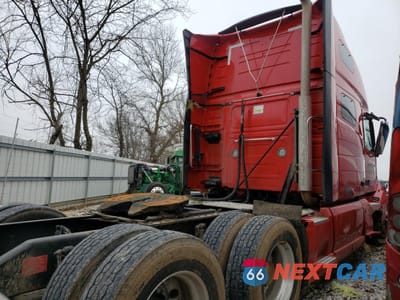 Czwarte zdjęcie samochodu z boku: 2022 VOLVO VN VNL VIN:4V4NC9EH3NN301053 - miniatura