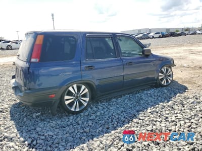 Trzecie zdjęcie samochodu z tyłu: 1999 HONDA CR-V LX VIN:JHLRD1840XC025968 - miniatura