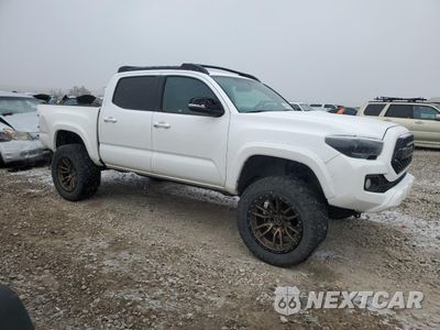 Czwarte zdjęcie samochodu z boku: 2017 TOYOTA TACOMA DOUBLE CAB VIN:3TMGZ5AN5HM059503 - miniatura