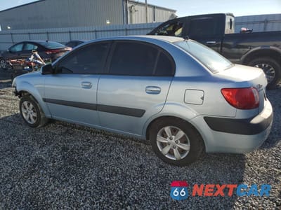 Drugie zdjęcie samochodu z przodu: 2009 KIA RIO BASE VIN:KNADE223696448059 - miniatura