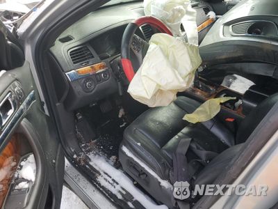 Zdjęcie 8 z 13 samochodu: 2013 LINCOLN MKS VIN:1LNHL9EK7DG616120 - miniatura