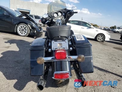 Czwarte zdjęcie samochodu z boku: 2009 HARLEY-DAVIDSON FLHTCU VIN:1HD1FC4139Y629711 - miniatura