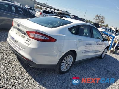 Trzecie zdjęcie samochodu z tyłu: 2015 FORD FUSION S HYBRID VIN:3FA6P0UU3FR106217 - miniatura