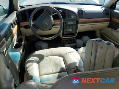 Zdjęcie 8 z 13 samochodu: 2000 LINCOLN CONTINENTAL VIN:1LNHM97V2YY802541 - miniatura