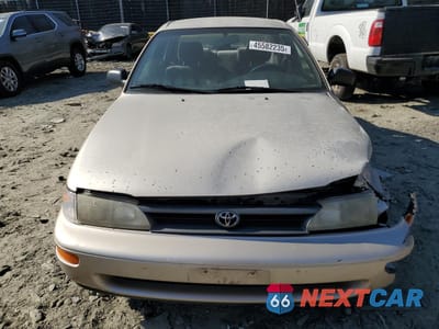 Piąte zdjęcie samochodu w środku: 1994 TOYOTA COROLLA LE VIN:2T1AE09B7RC081818 - miniatura