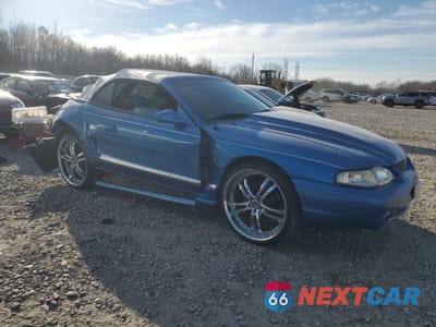 Czwarte zdjęcie samochodu z boku: 1994 FORD MUSTANG GT VIN:1FALP45T2RF220324 - miniatura