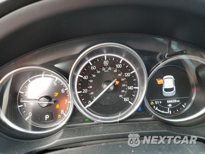 Zdjęcie 9 z 14 samochodu: 2021 MAZDA CX-5 TOURING VIN:JM3KFBCM3M0374231 - miniatura