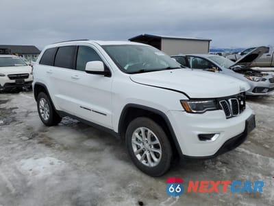 Czwarte zdjęcie samochodu z boku: 2022 JEEP GRAND CHEROKEE LAREDO E VIN:1C4RJFAGXNC141795 - miniatura